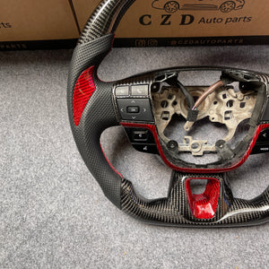 CZD Auto Parts carbon fiber steering wheel for Toyota Camry 2025 with black perforated leather
