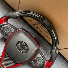 Load image into Gallery viewer, CZD autoparts for Toyota 8th gen Camry se xse le xle 2018-2022 carbon fiber steering wheel with red thumb grips