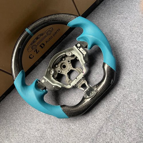 CZD autoparts for  Nissan 7th gen Maxima 2009-2014 carbon fiber steering wheel with tiffany blue perforated leather side