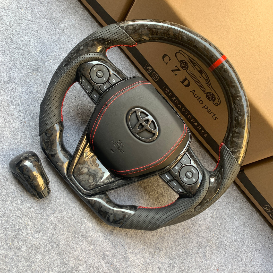CZD Autoparts for Toyota Avalon 2018-2022 carbon fiber steering wheel toyota badge at the middle of airbag cover