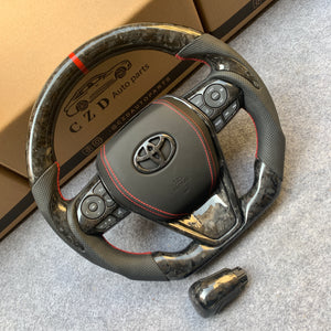 CZD Autoparts for Toyota 8th gen Camry se xse le xle 2018-2022 carbon fiber steering wheel airbag cover with toyota badge