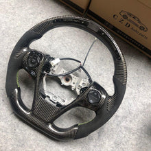 Load image into Gallery viewer, CZD For 2013、2014、2015、2016、2017 7th Toyota Gamry carbon fiber steering wheel with perforated leather sides