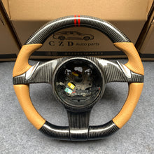 Load image into Gallery viewer, CZD auto parts for All Carrera models - 2012.5-2016 carbon fiber steering wheel with orange perforated leather side
