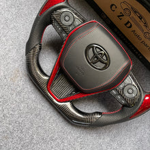 Load image into Gallery viewer, CZD autoparts for Toyota 8th gen Camry se xse le xle 2018-2022 carbon fiber steering wheel with red thumb grips