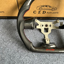 Load image into Gallery viewer, CZD autoparts for  Chevrolet Corvette C6 Z06 C6 2005-2013 carbon fiber steering wheel with a red logo in the bottom