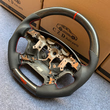 Load image into Gallery viewer, CZD Autoparts for Toyota  Land Cruiser/ Land Cruiser (200 Series)/ Land Cruiser (70 Series)/ Tundra/  Sequoia/ HiAce 20007-2019 carbon fiber steering wheel with red TRO logo