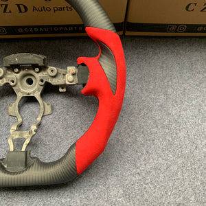 CZD Nissan 370Z /Z34 /Juke/ Maxima Matte carbon fiber steering wheel with thumb grips