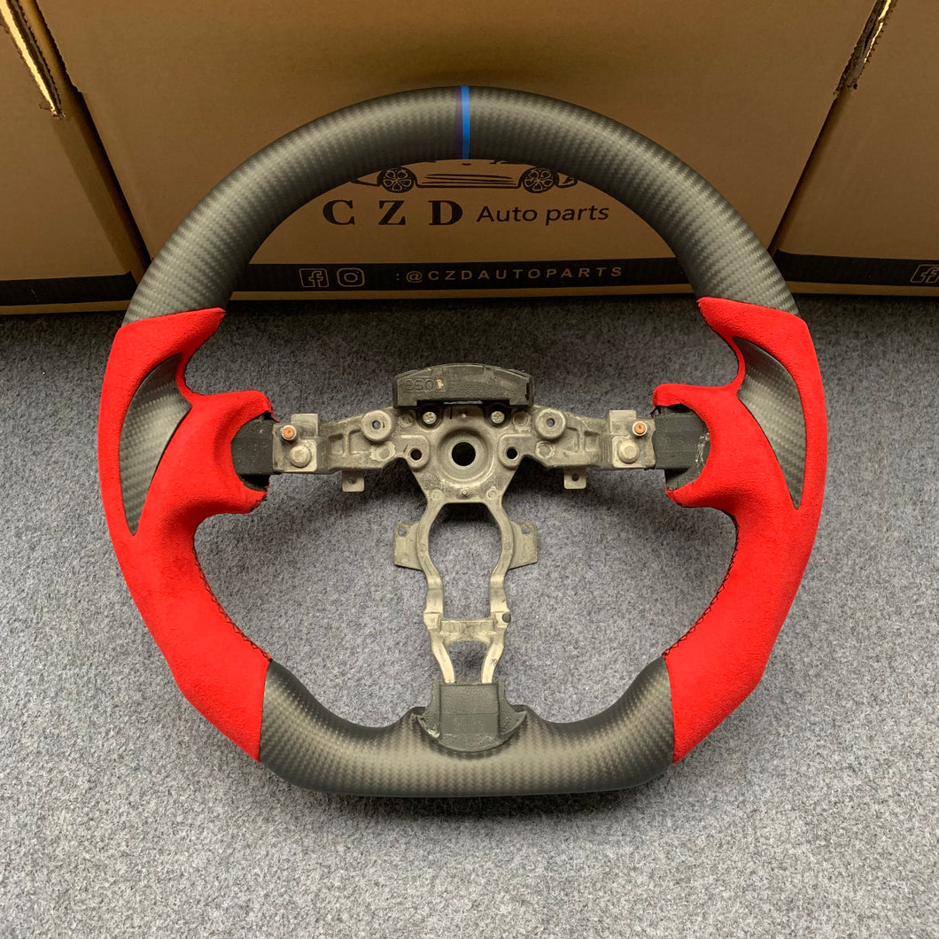 CZD Nissan 370Z /Z34 /Juke/ Maxima Matte carbon fiber steering wheel with thumb grips