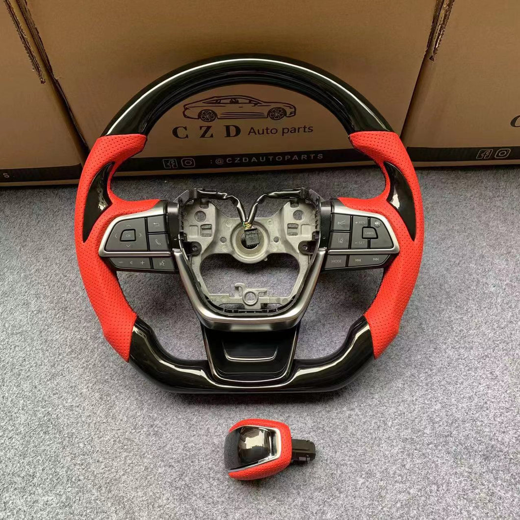 CZD Toyota Highlander 2020/2021/2022 glossy black steering wheel with thumb grips