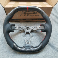 Load image into Gallery viewer, CZD Nissan 7th gen Maxima 2009-2014 carbon fiber steering wheel with logo