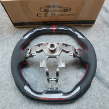 Load image into Gallery viewer, CZD Nissan 7th gen Maxima 2009-2014 carbon fiber steering wheel with logo